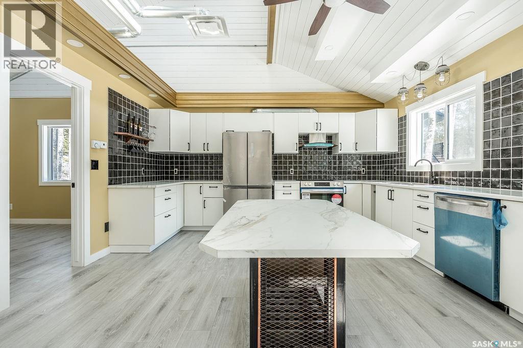 1 May Bay, Delaronde Lake, SK - Indoor Photo Showing Kitchen With Stainless Steel Kitchen With Upgraded Kitchen