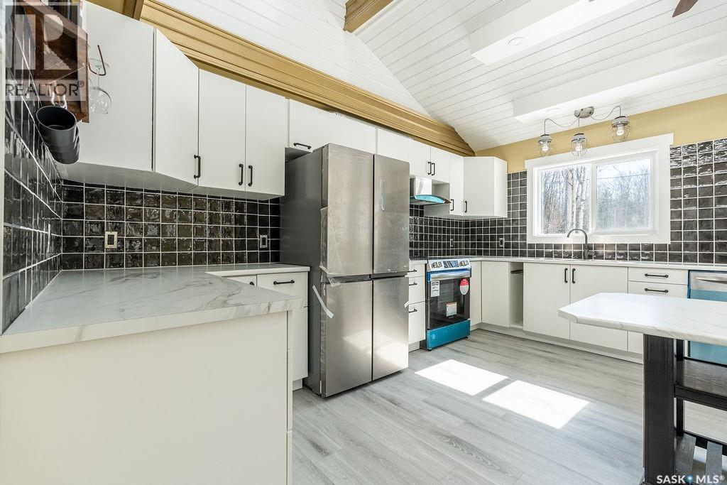 1 May Bay, Delaronde Lake, SK - Indoor Photo Showing Kitchen With Stainless Steel Kitchen