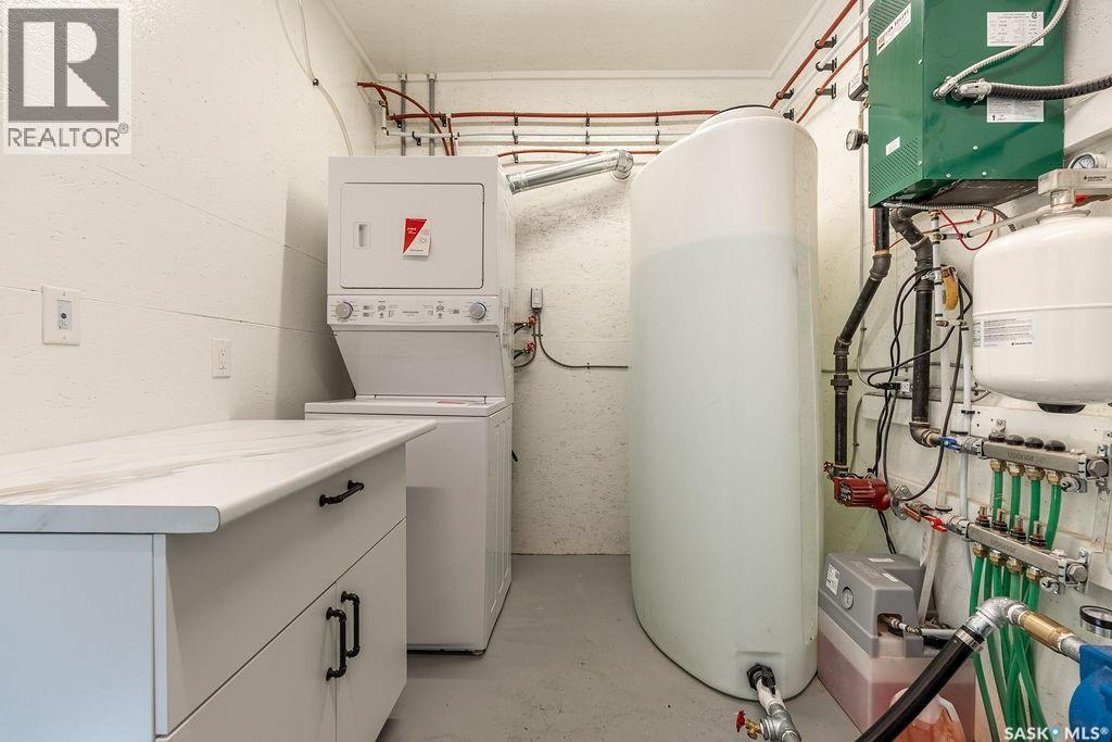 1 May Bay, Delaronde Lake, SK - Indoor Photo Showing Laundry Room