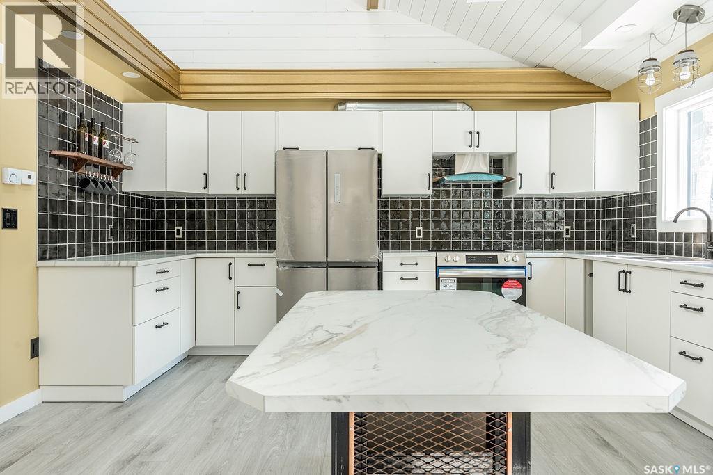 1 May Bay, Delaronde Lake, SK - Indoor Photo Showing Kitchen With Stainless Steel Kitchen With Upgraded Kitchen