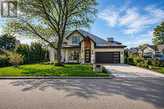 1348 HOLLYROOD AVENUE  Mississauga, ON L5G 3J4