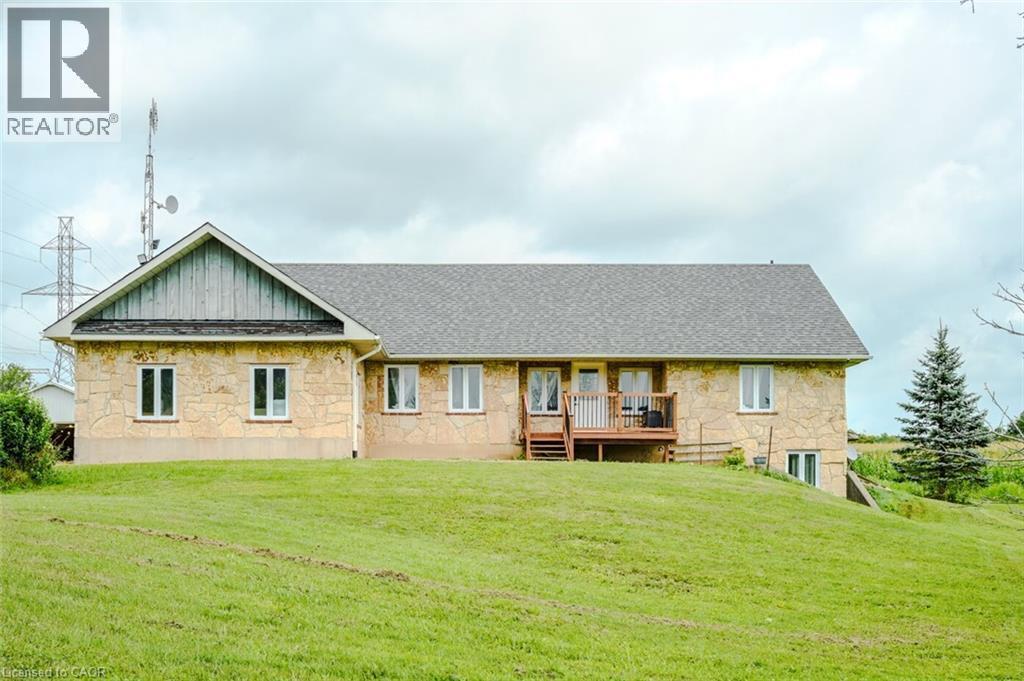 Stone veneer exterior with multiple windows - 107 6Th Line Line, Caledonia, ON - Outdoor