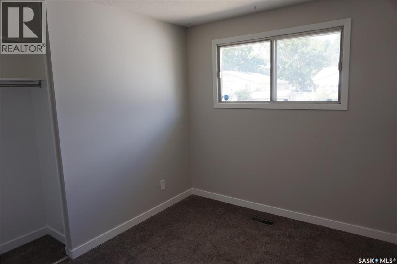 91 Plant Crescent, Regina, SK - Indoor Photo Showing Other Room