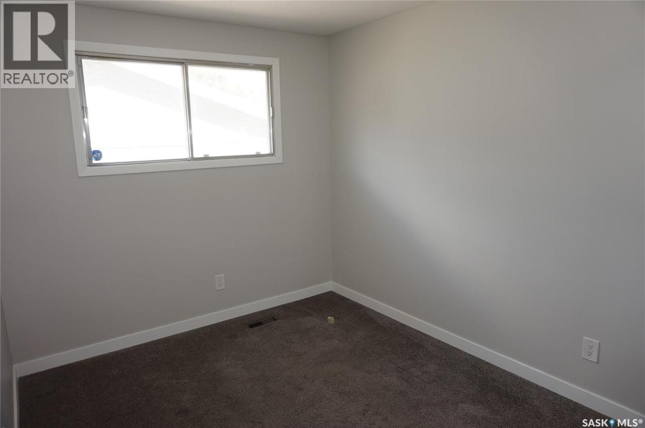 91 Plant Crescent, Regina, SK - Indoor Photo Showing Other Room