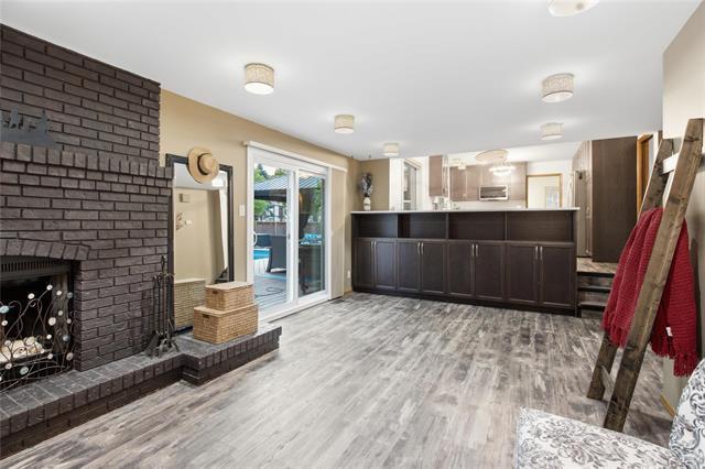 3 Attache Pl, Winnipeg, MB - Indoor Photo Showing Other Room With Fireplace