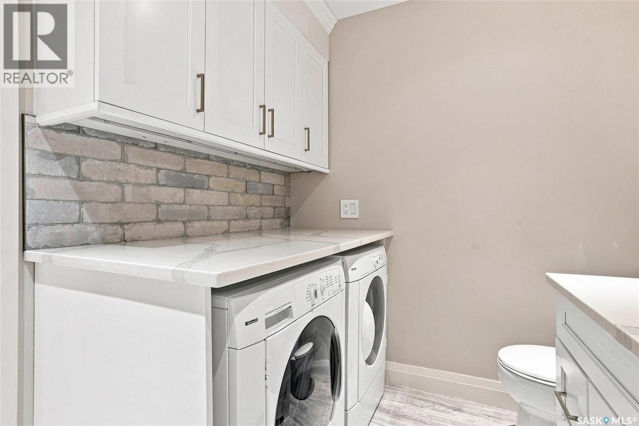 42 3415 Calder Crescent, Saskatoon, SK - Indoor Photo Showing Laundry Room