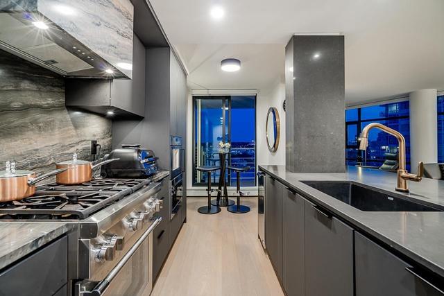 2207-198 Aquarius Mews  Vancouver, BC V6Z 2Y4
