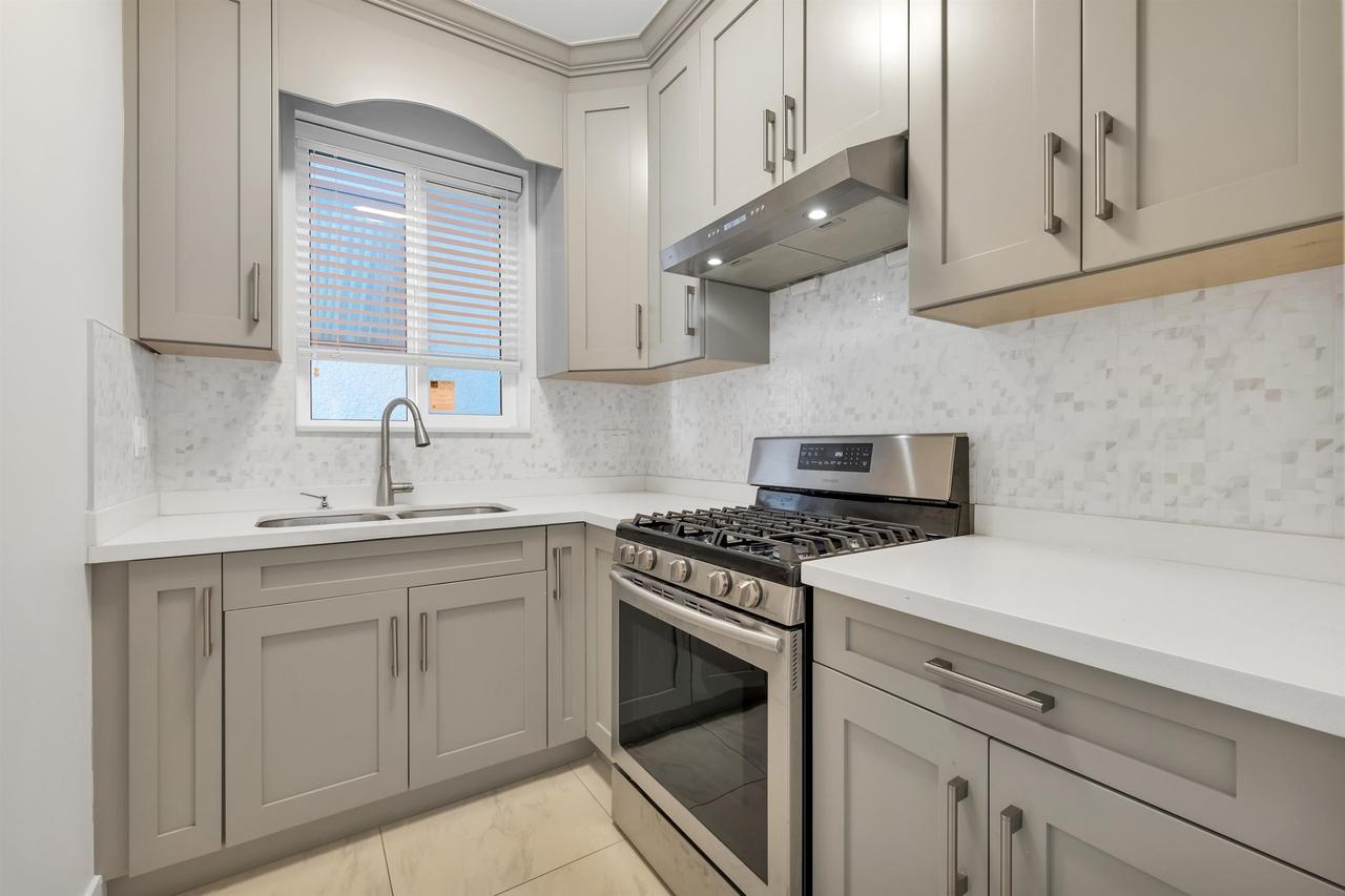 5887 Battison Street, Vancouver, BC - Indoor Photo Showing Kitchen With Double Sink With Upgraded Kitchen