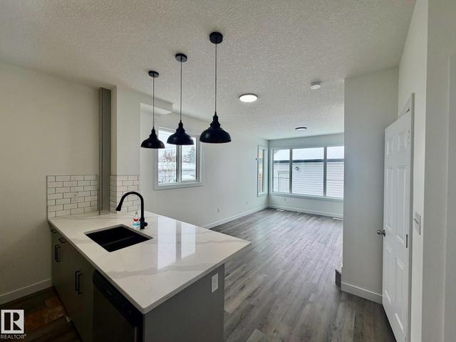 UPPER 11234 95 Street NW  Edmonton, AB T5G 1K9