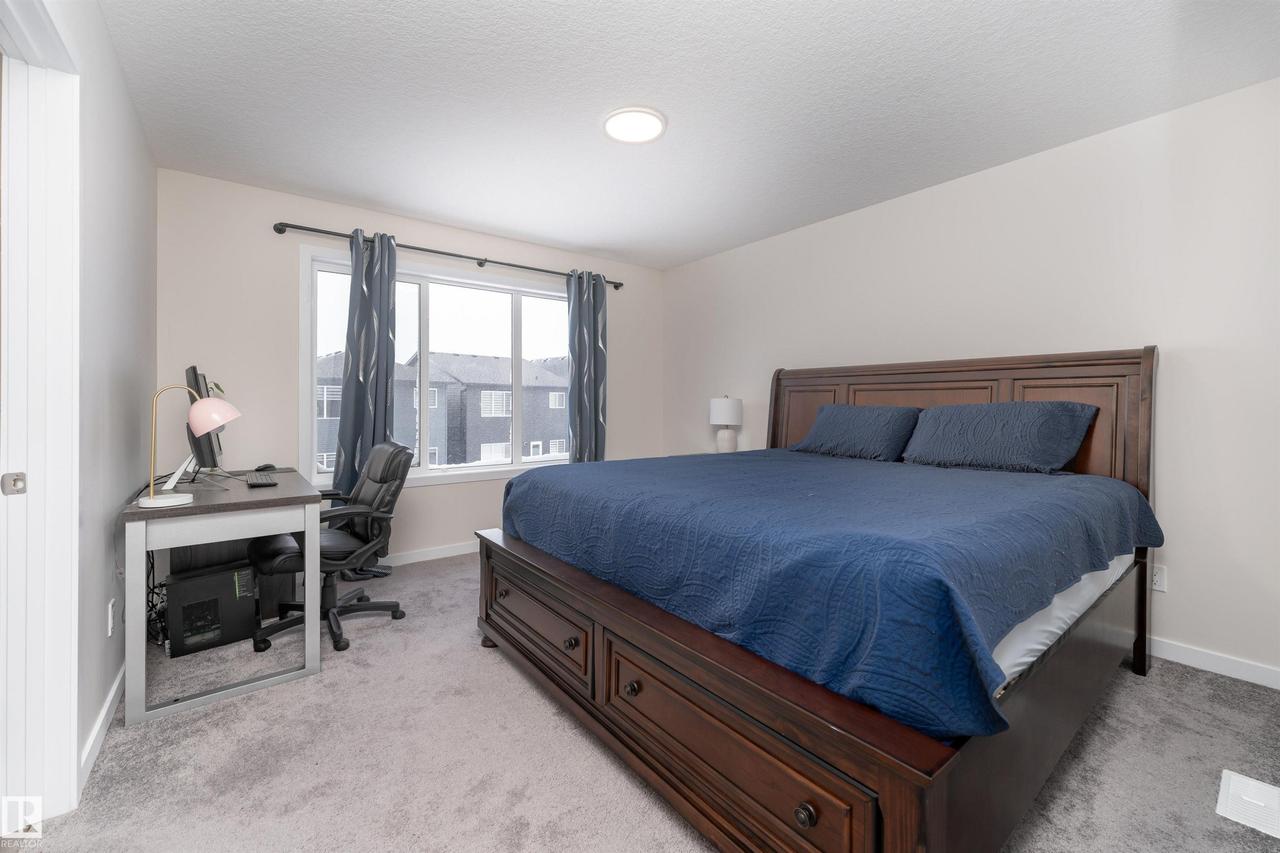 2120 Muckleplum Crescent Sw, Edmonton, AB - Indoor Photo Showing Bedroom