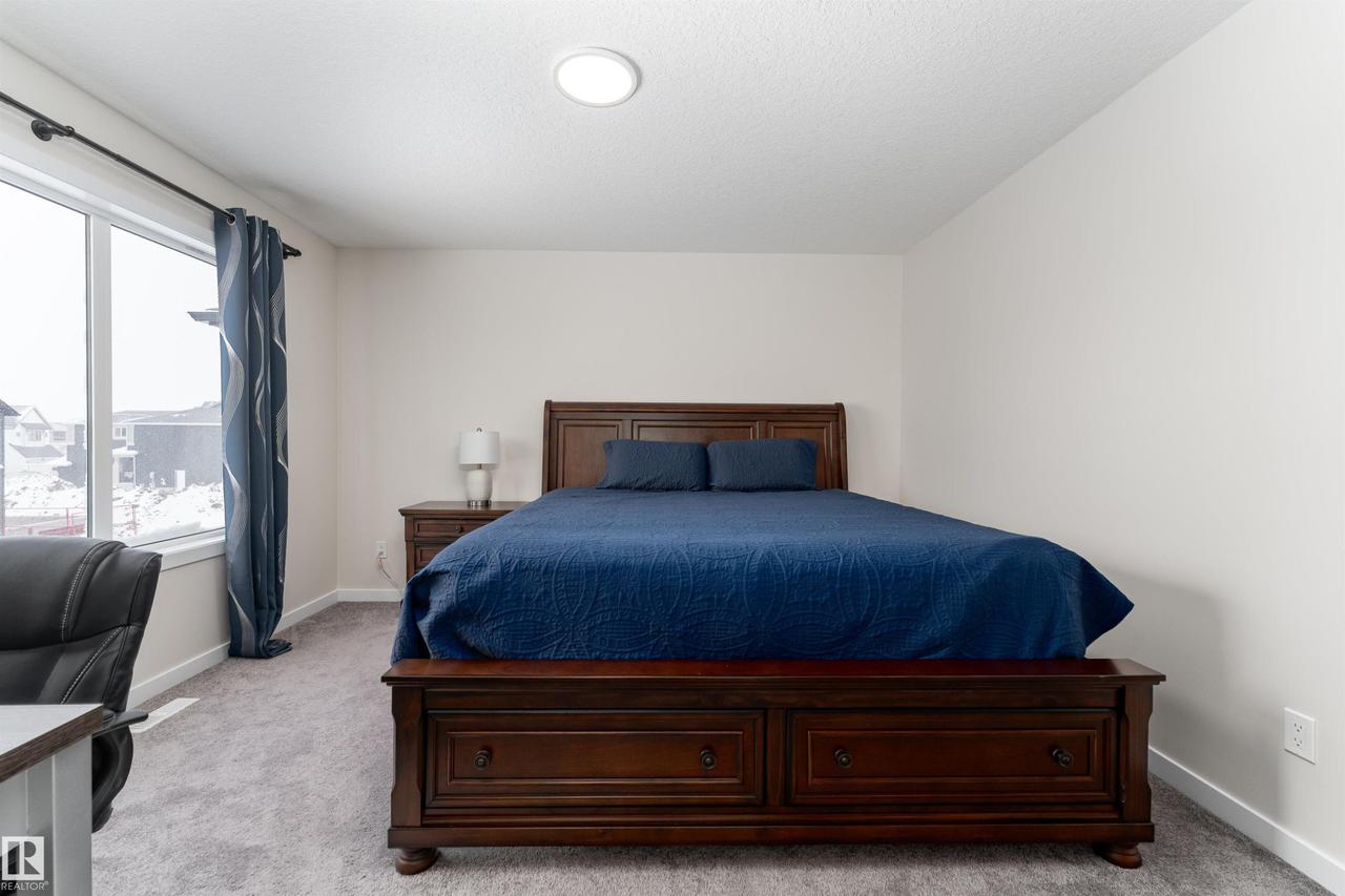 2120 Muckleplum Crescent Sw, Edmonton, AB - Indoor Photo Showing Bedroom