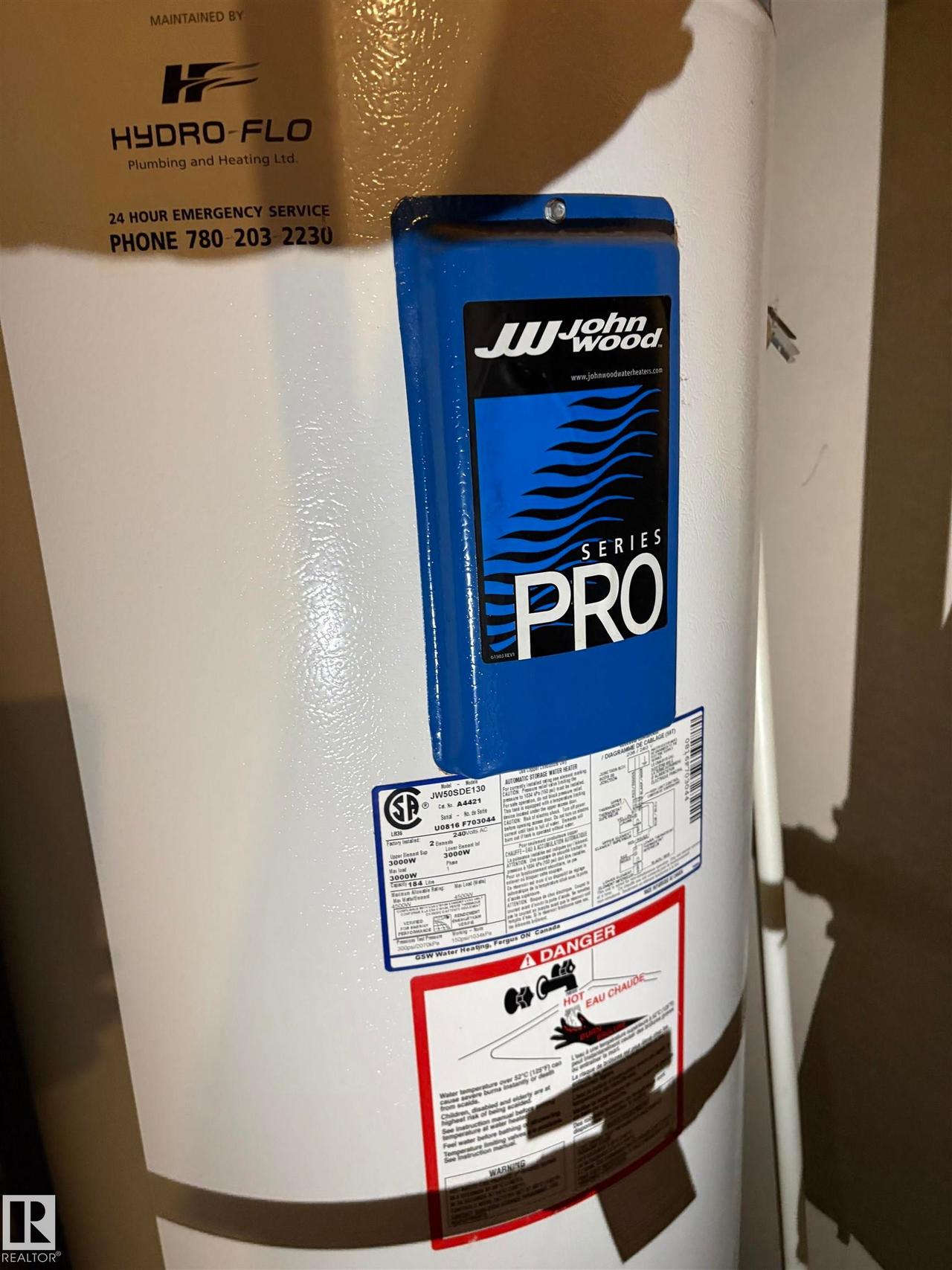 John Wood Series Pro water heater - #184 1804 70 St Sw, Edmonton, AB - Indoor Photo Showing Other Room