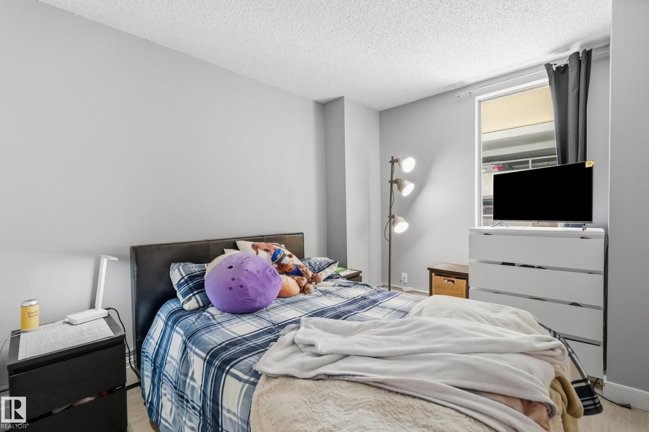 #200 10149 Saskatchewan Dr Nw, Edmonton, AB - Indoor Photo Showing Bedroom