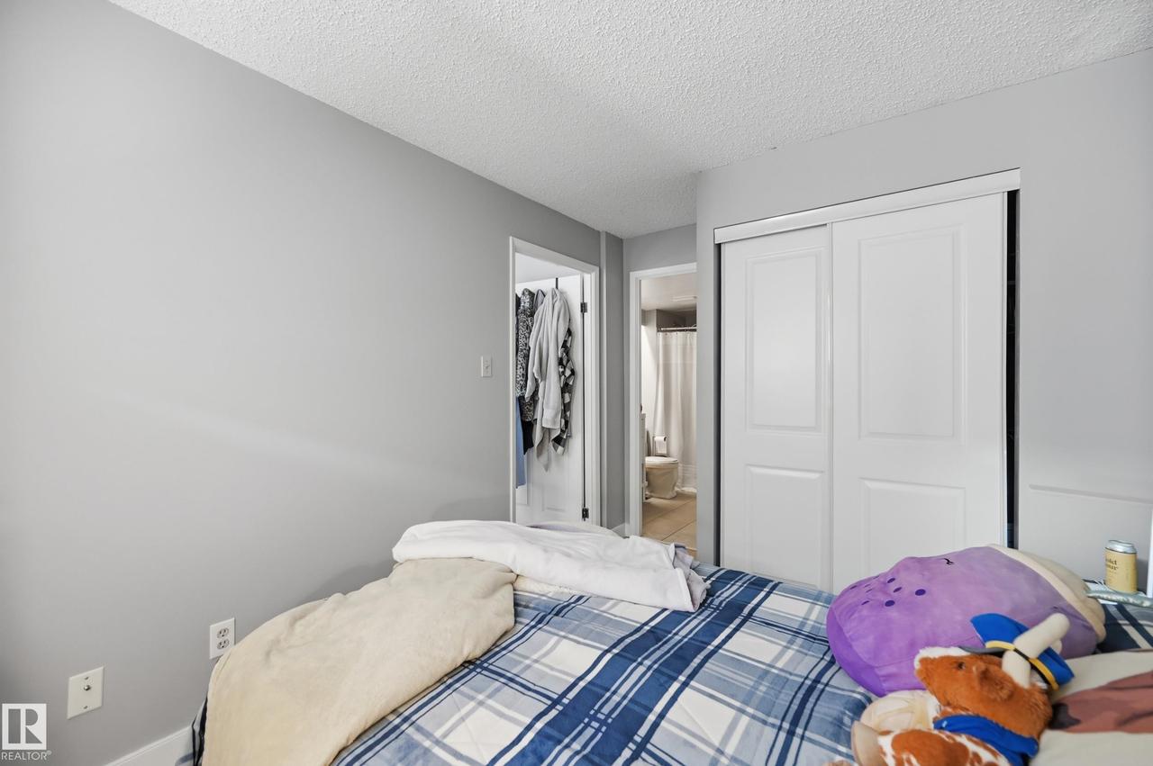 #200 10149 Saskatchewan Dr Nw, Edmonton, AB - Indoor Photo Showing Bedroom