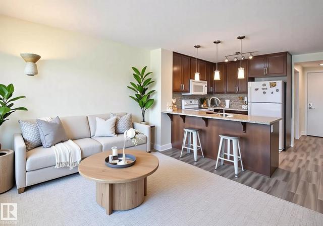 #210 3670 139 AV NW  Edmonton, AB T5Y 3N5