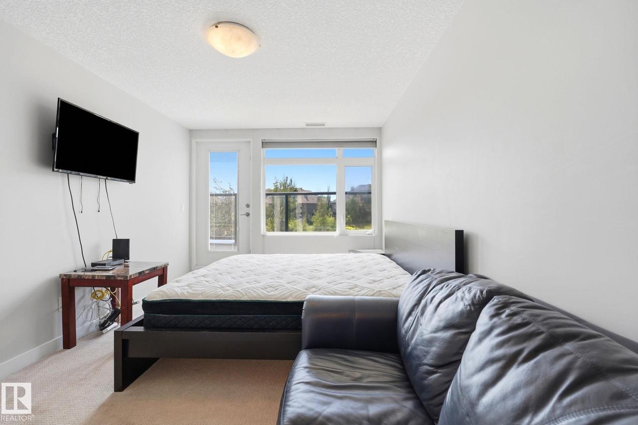 #125 5151 Windermere Boulevard Sw, Edmonton, AB - Indoor Photo Showing Bedroom