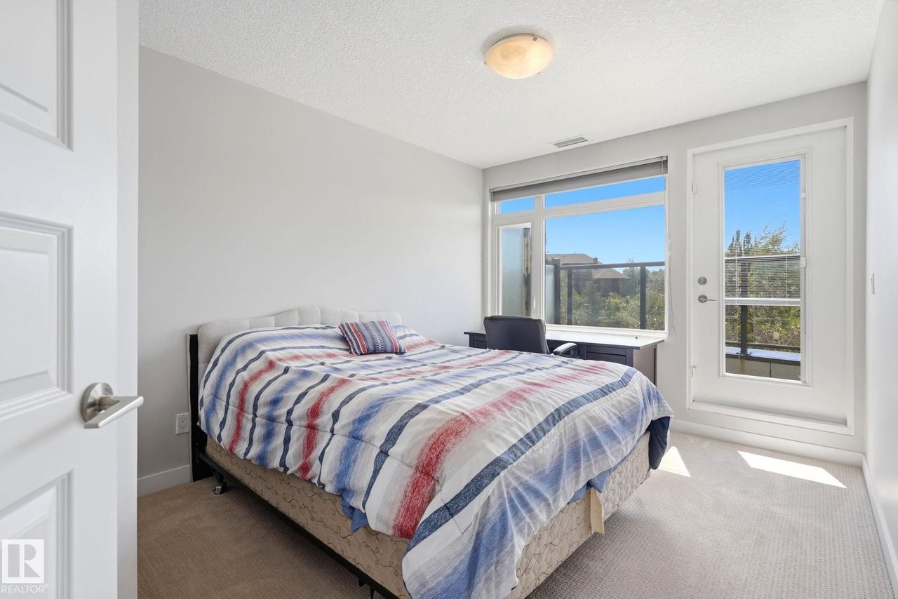 #125 5151 Windermere Boulevard Sw, Edmonton, AB - Indoor Photo Showing Bedroom