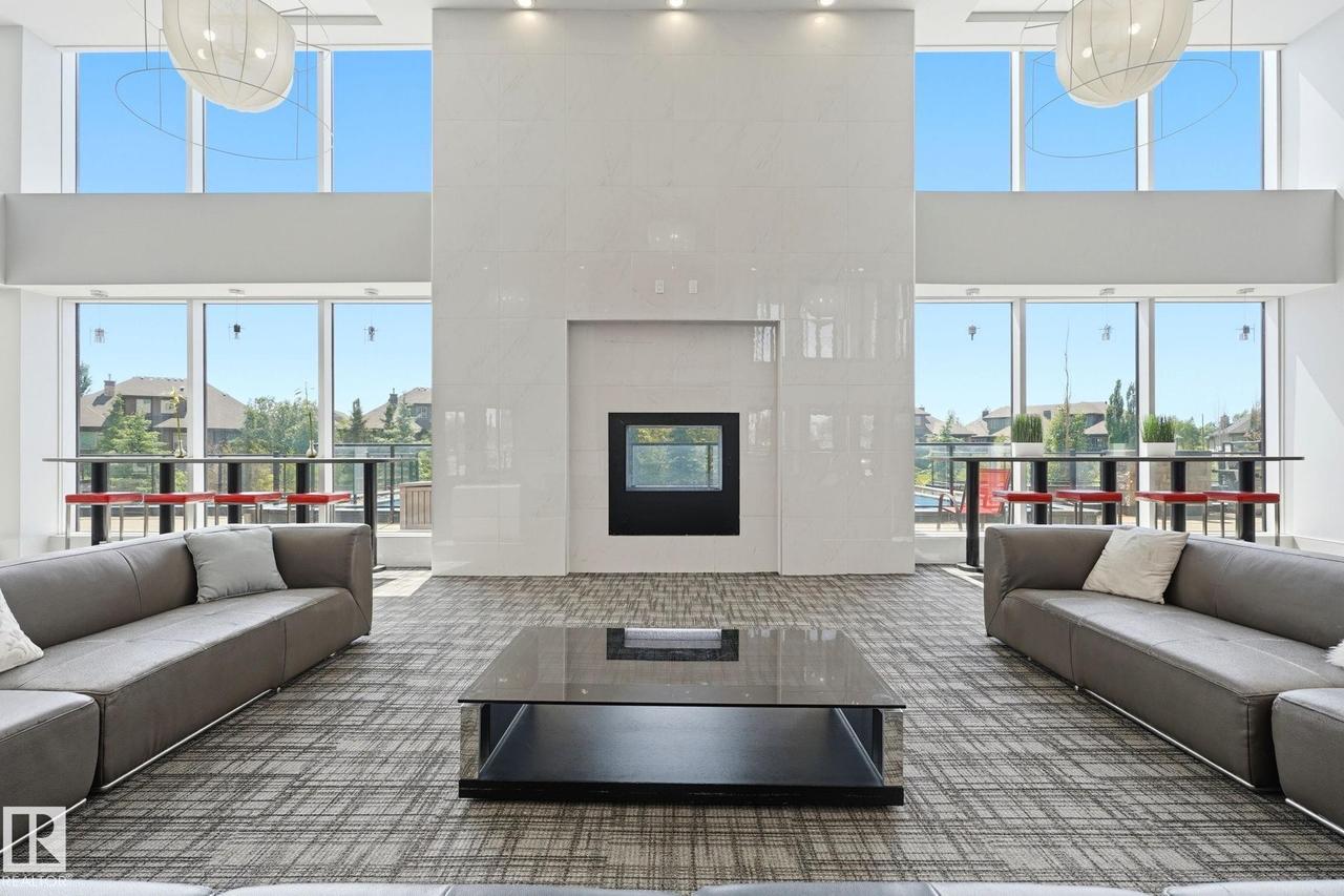 #125 5151 Windermere Boulevard Sw, Edmonton, AB - Indoor Photo Showing Living Room