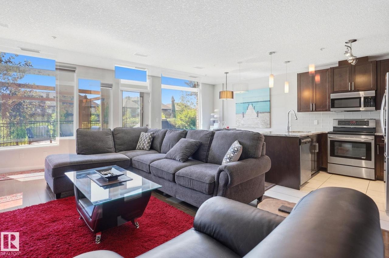 #125 5151 Windermere Boulevard Sw, Edmonton, AB - Indoor Photo Showing Living Room