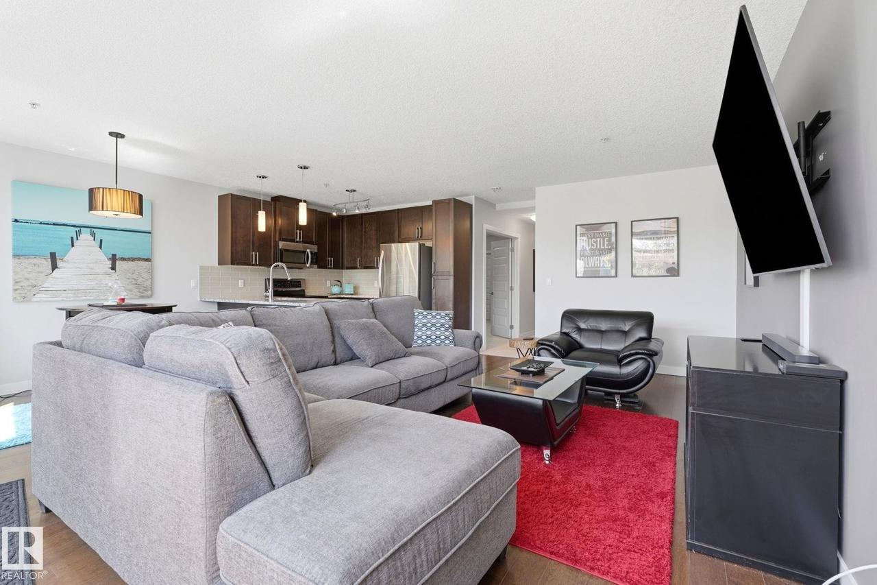 #125 5151 Windermere Boulevard Sw, Edmonton, AB - Indoor Photo Showing Living Room