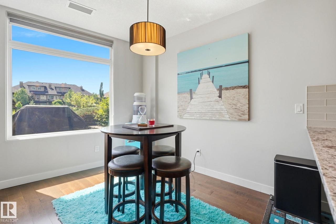 #125 5151 Windermere Boulevard Sw, Edmonton, AB - Indoor Photo Showing Dining Room