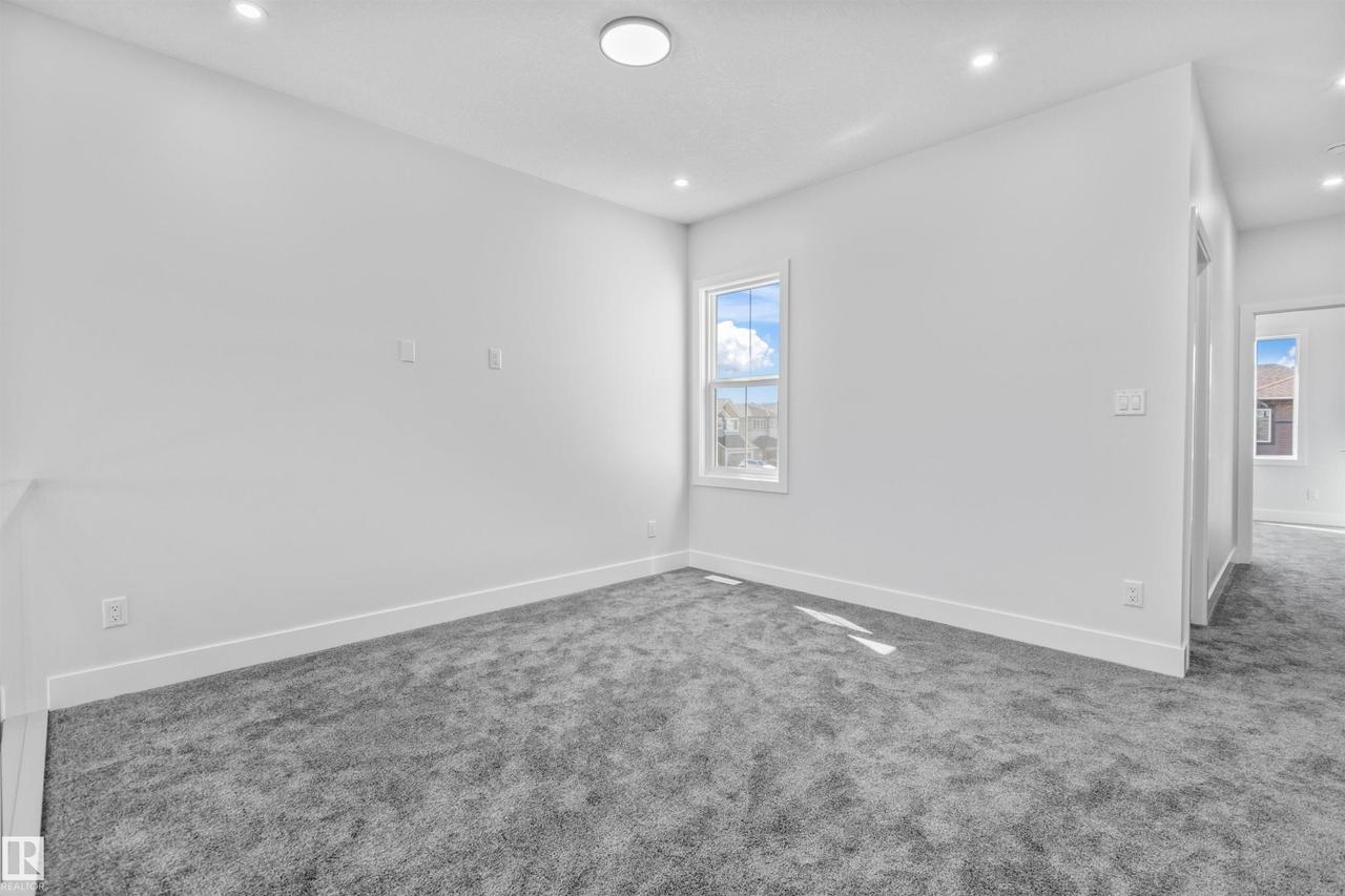 190 Elliott Wynd, Fort Saskatchewan, AB - Indoor Photo Showing Other Room