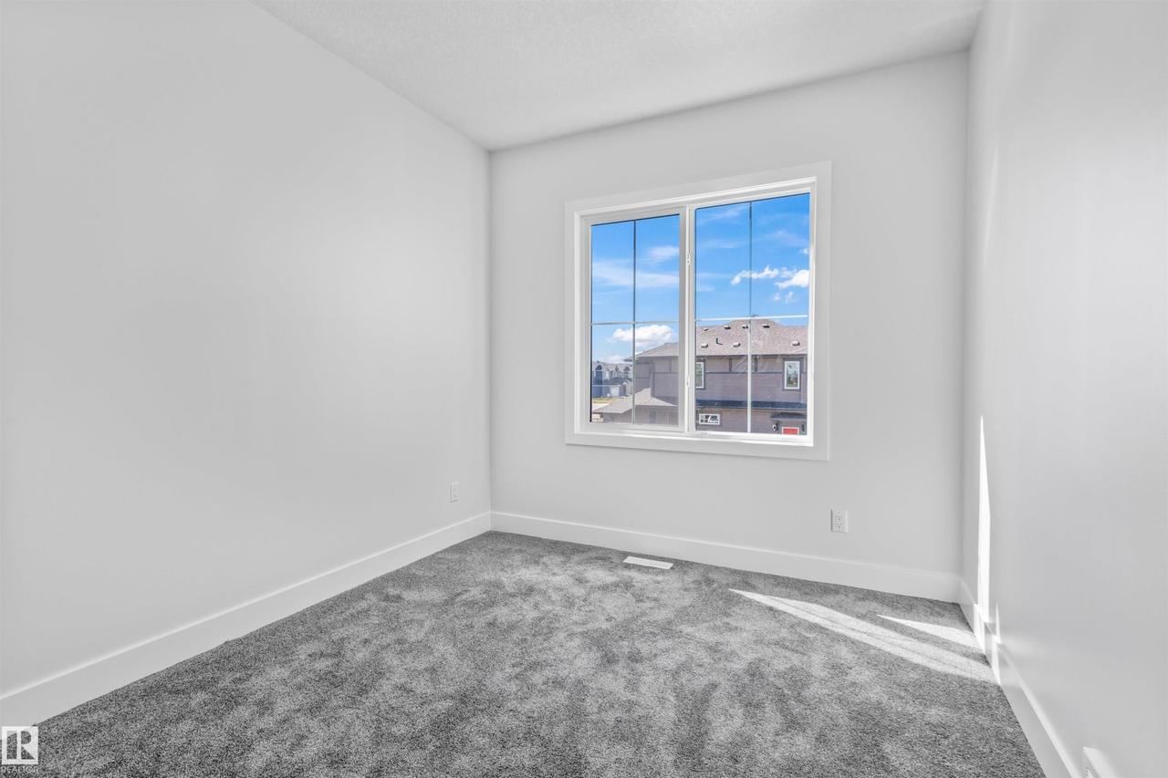 190 Elliott Wynd, Fort Saskatchewan, AB - Indoor Photo Showing Other Room