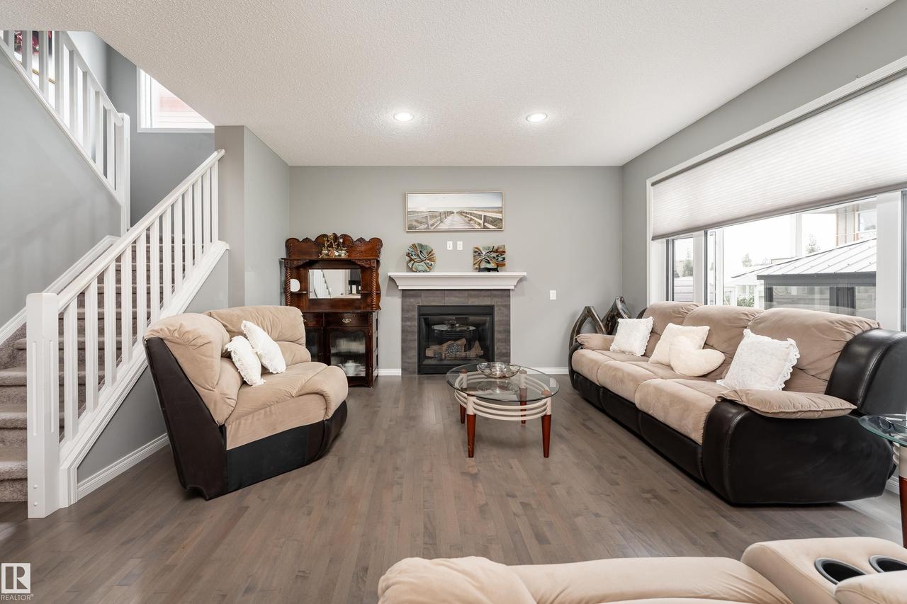 2055 Redtail Common Nw, Edmonton, AB - Indoor Photo Showing Living Room With Fireplace