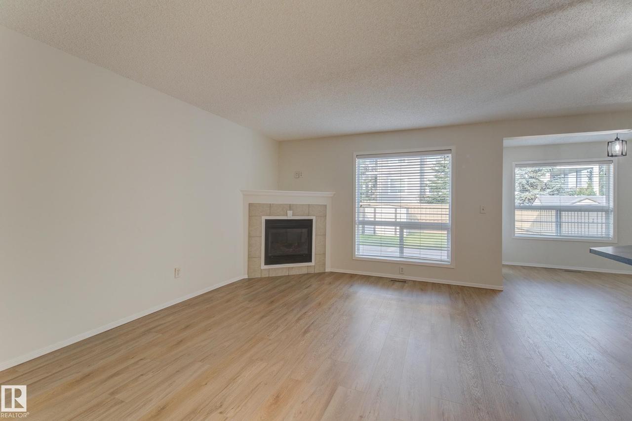 9145 Scott Crescent Nw, Edmonton, AB - Indoor Photo Showing Living Room With Fireplace