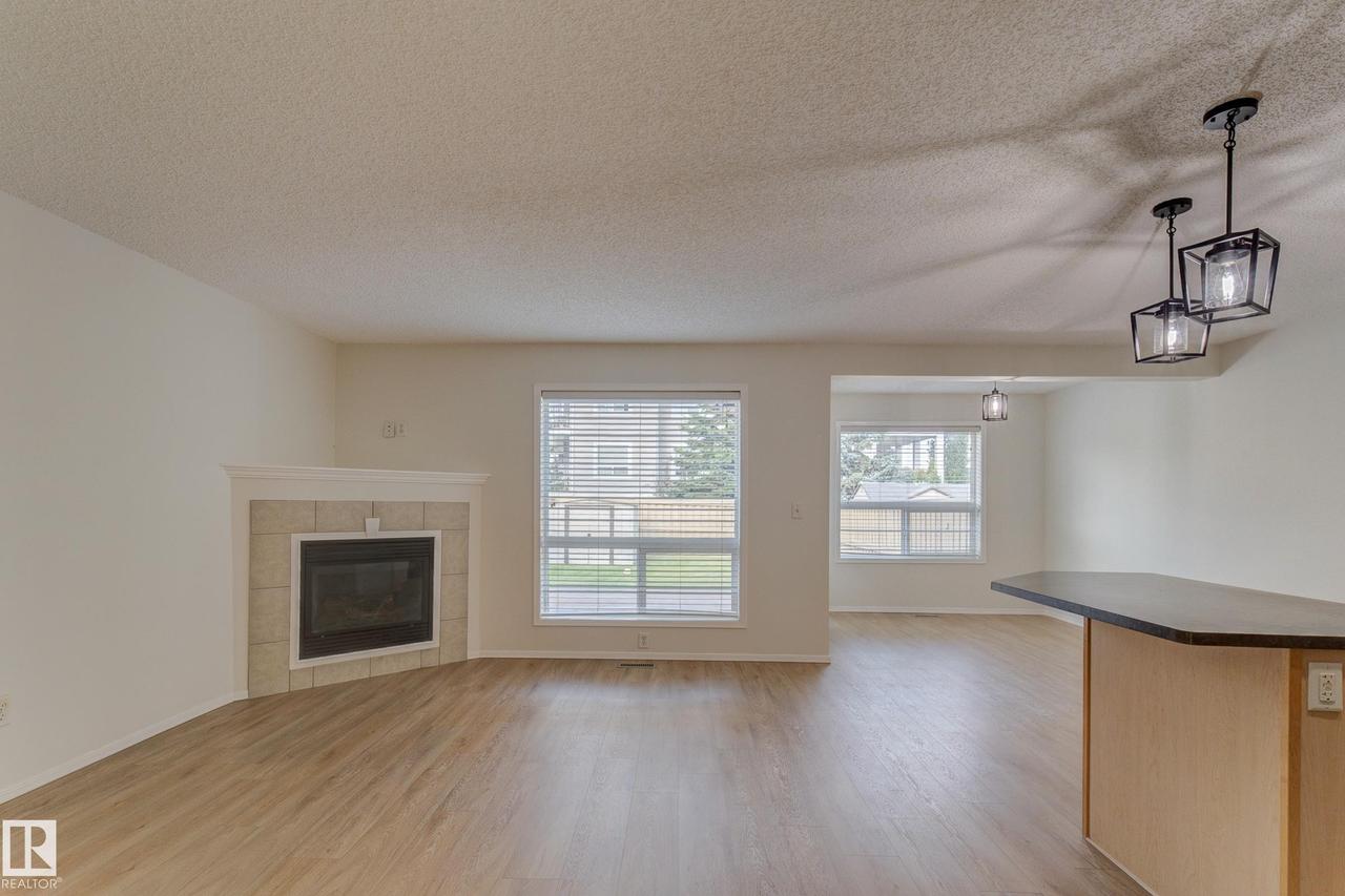 9145 Scott Crescent Nw, Edmonton, AB - Indoor Photo Showing Living Room With Fireplace