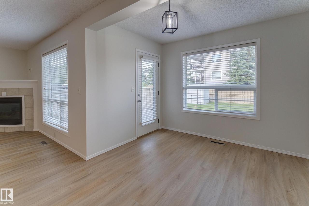 9145 Scott Crescent Nw, Edmonton, AB - Indoor With Fireplace
