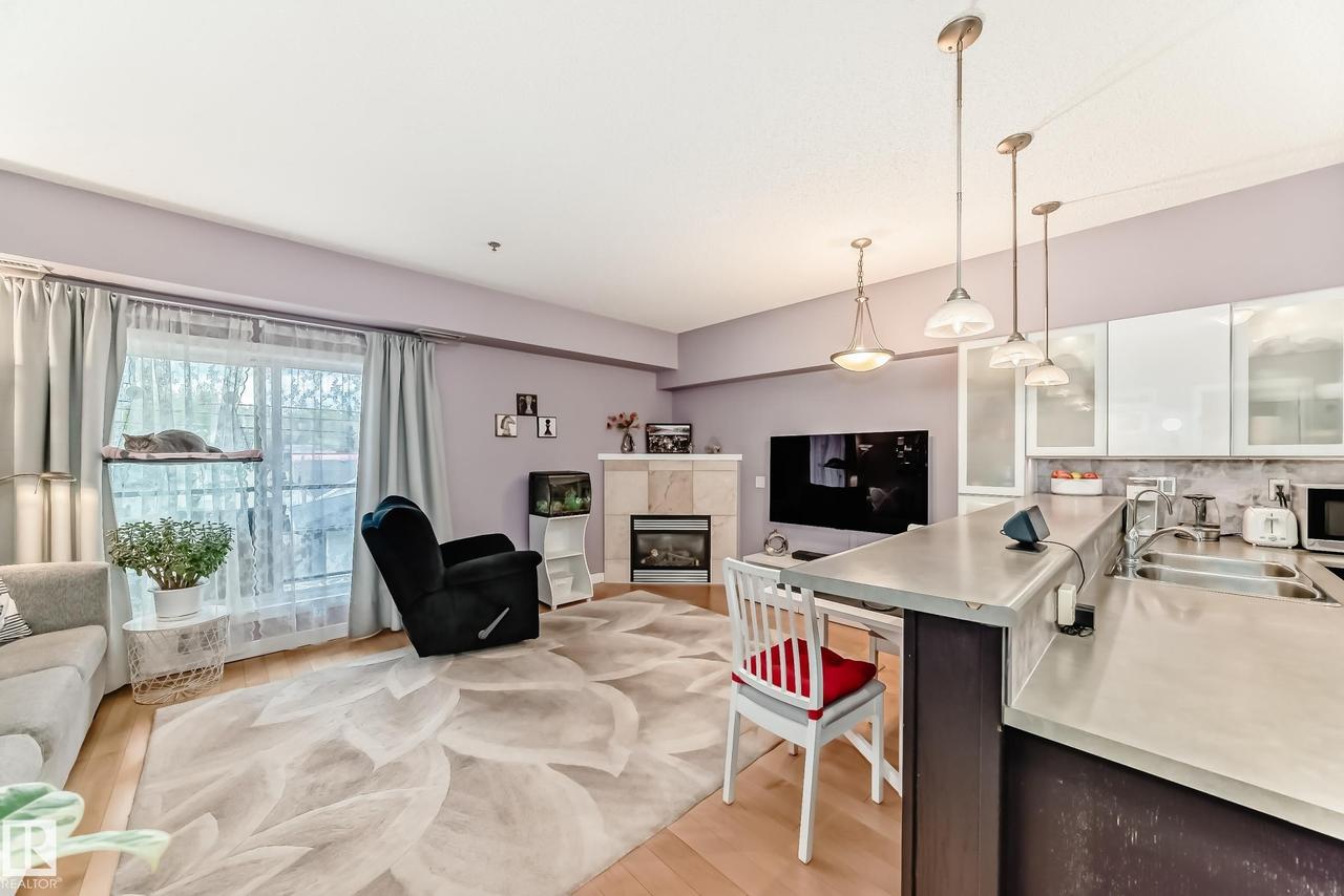 #211 9750 94 St Nw, Edmonton, AB - Indoor With Fireplace