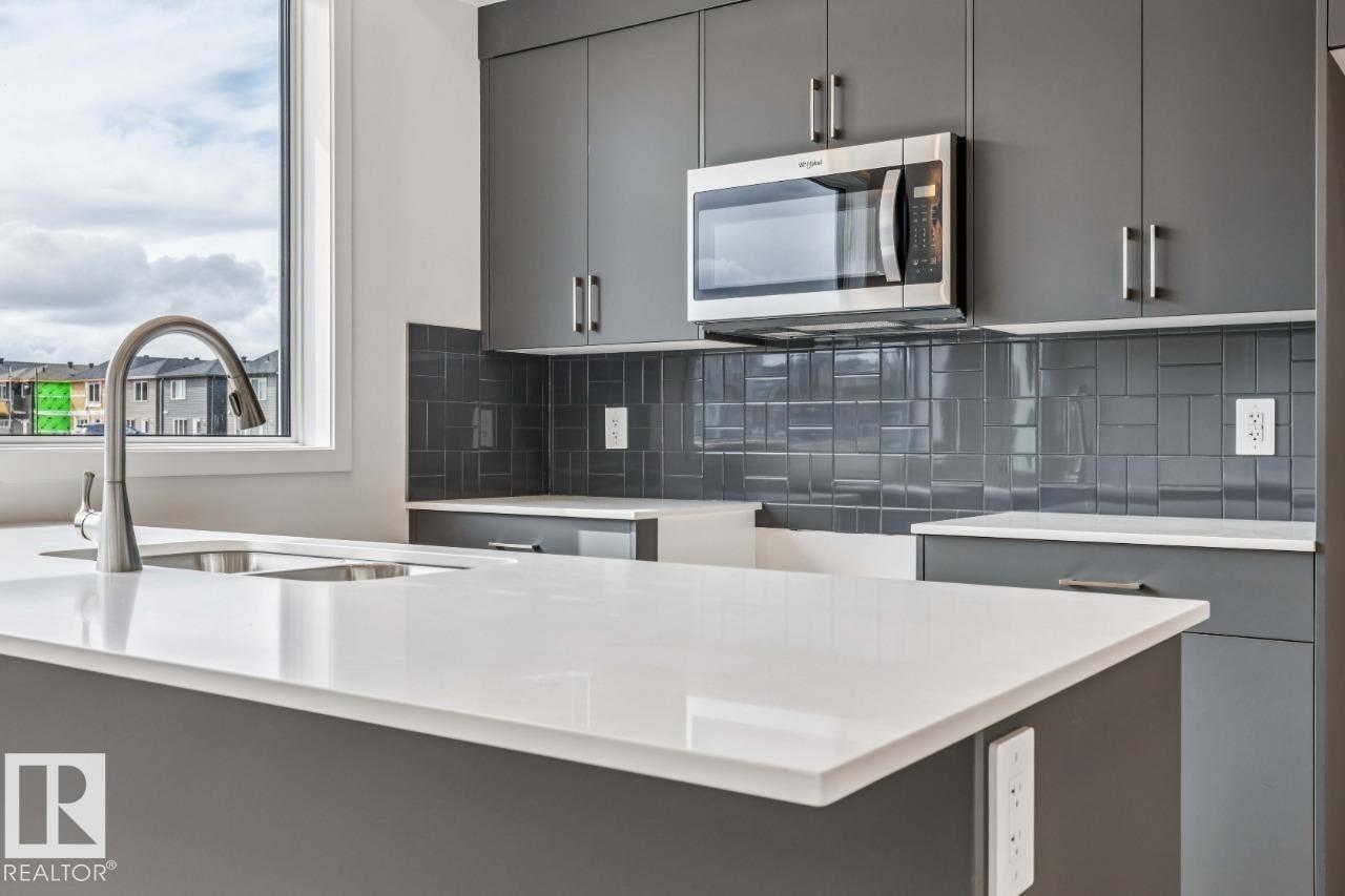 8024 228 Street Nw, Edmonton, AB - Indoor Photo Showing Kitchen With Double Sink With Upgraded Kitchen