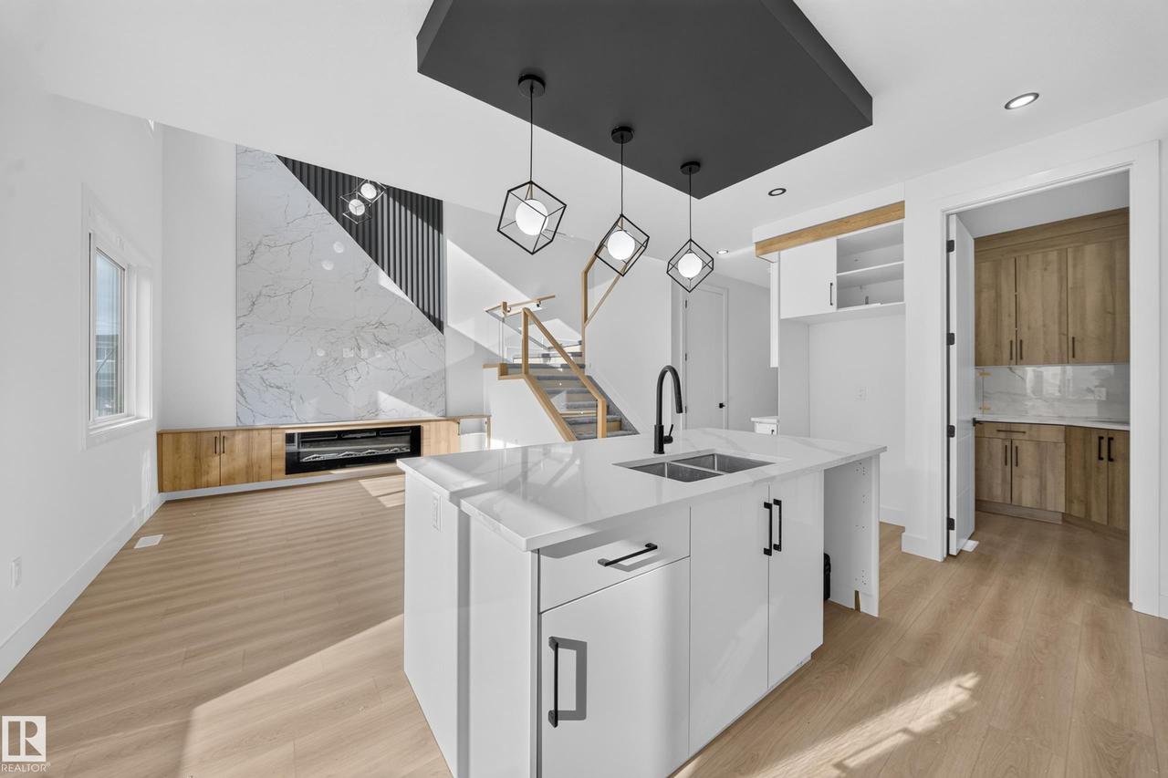 8512 Mayday Run Sw, Edmonton, AB - Indoor Photo Showing Kitchen With Double Sink