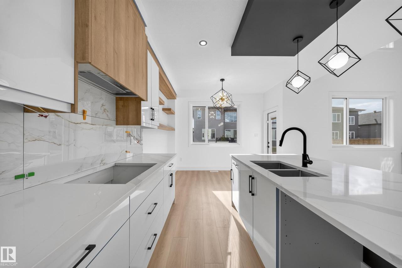 8512 Mayday Run Sw, Edmonton, AB - Indoor Photo Showing Kitchen With Double Sink With Upgraded Kitchen