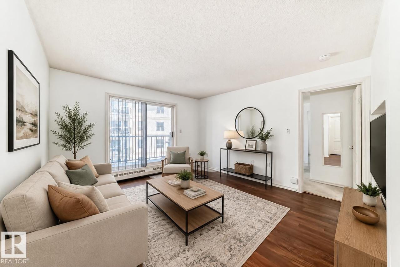Virtually staged - #320 9620 174 St Nw, Edmonton, AB - Indoor Photo Showing Living Room