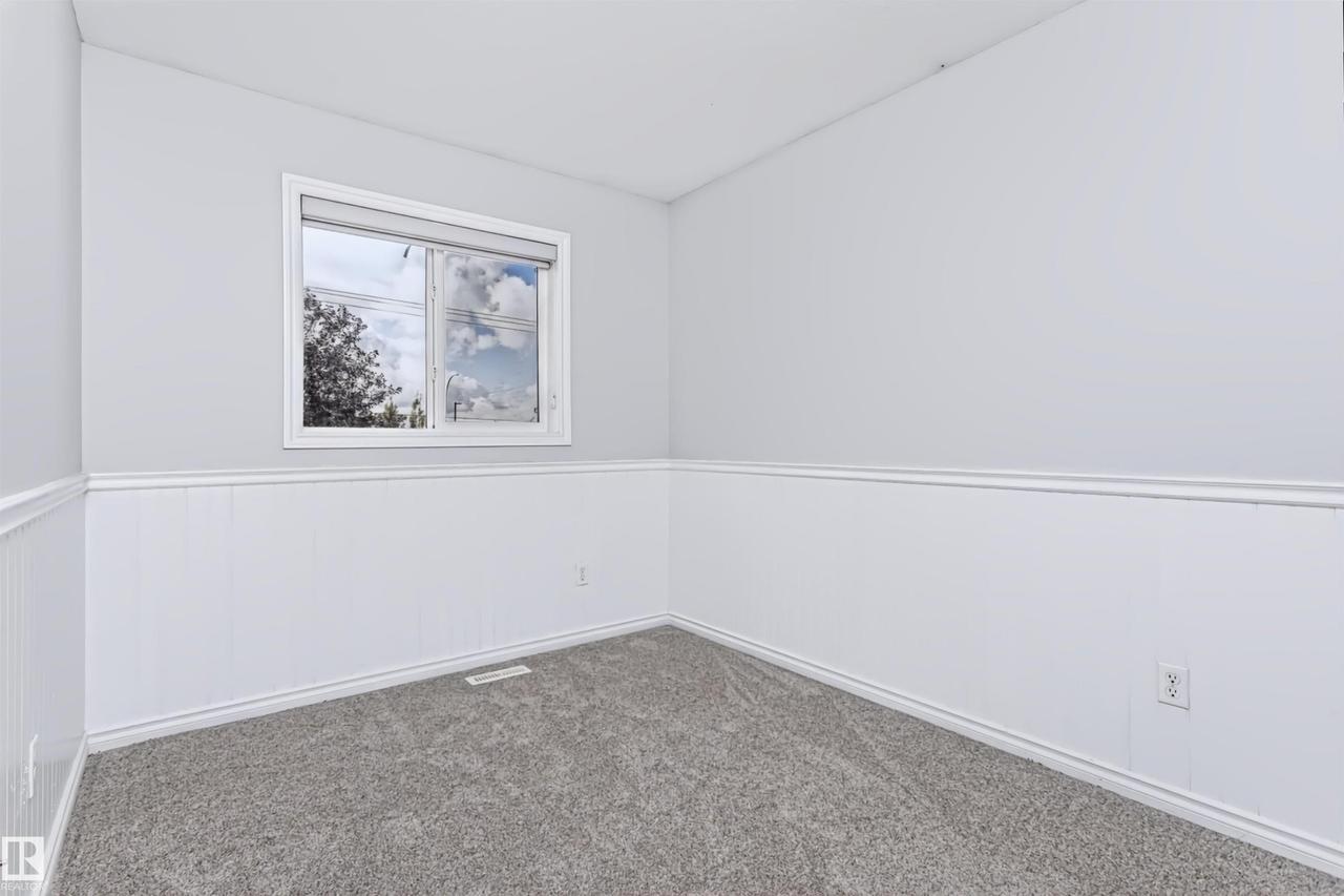 76 Bonin Crescent, Beaumont, AB - Indoor Photo Showing Garage