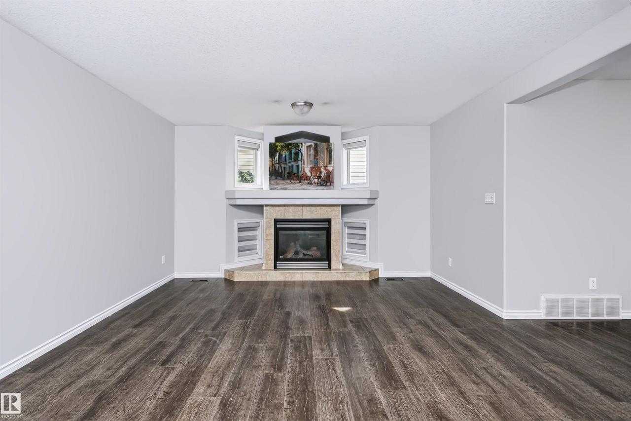 76 Bonin Crescent, Beaumont, AB - Indoor With Fireplace