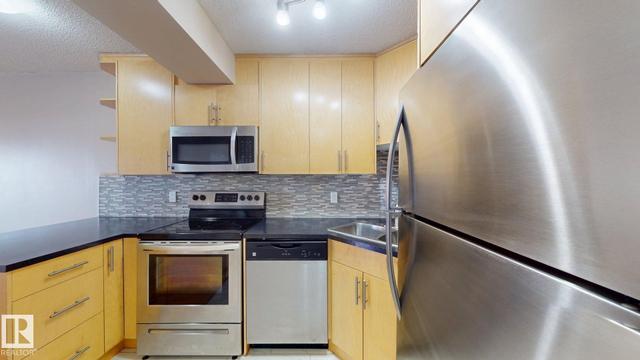 #307 10140 120 street NW  Edmonton, AB T5K 1Z8