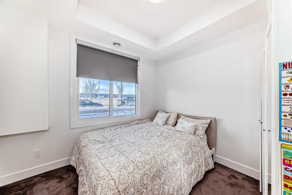 4697 Seton Drive Se, Calgary, AB - Indoor Photo Showing Bedroom