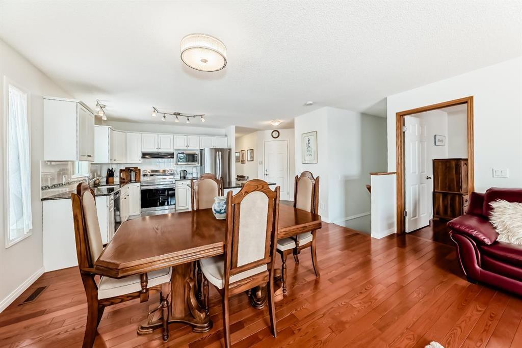 157 Hawkstone Manor Nw, Calgary, AB - Indoor Photo Showing Dining Room