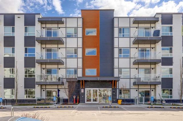 106-360 Harvest Hills Way Calgary, AB T3K 2S1