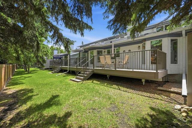 22A Woodmeadow Close SW Calgary, AB T2W 4L8
