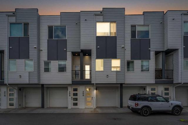 208-101 Panatella Square NW Calgary, AB T3K 2R9