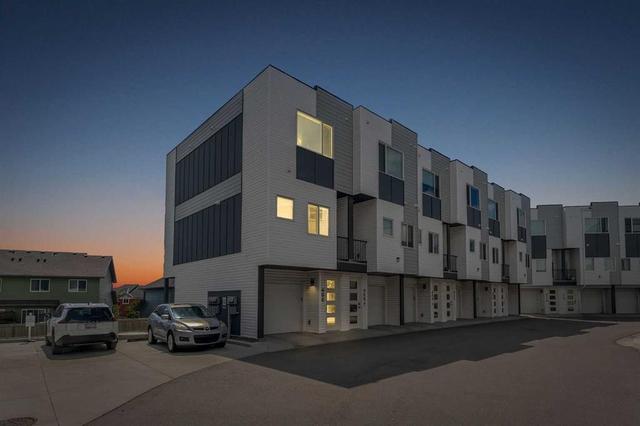 406-101 Panatella Square NW Calgary, AB T3K 2R9