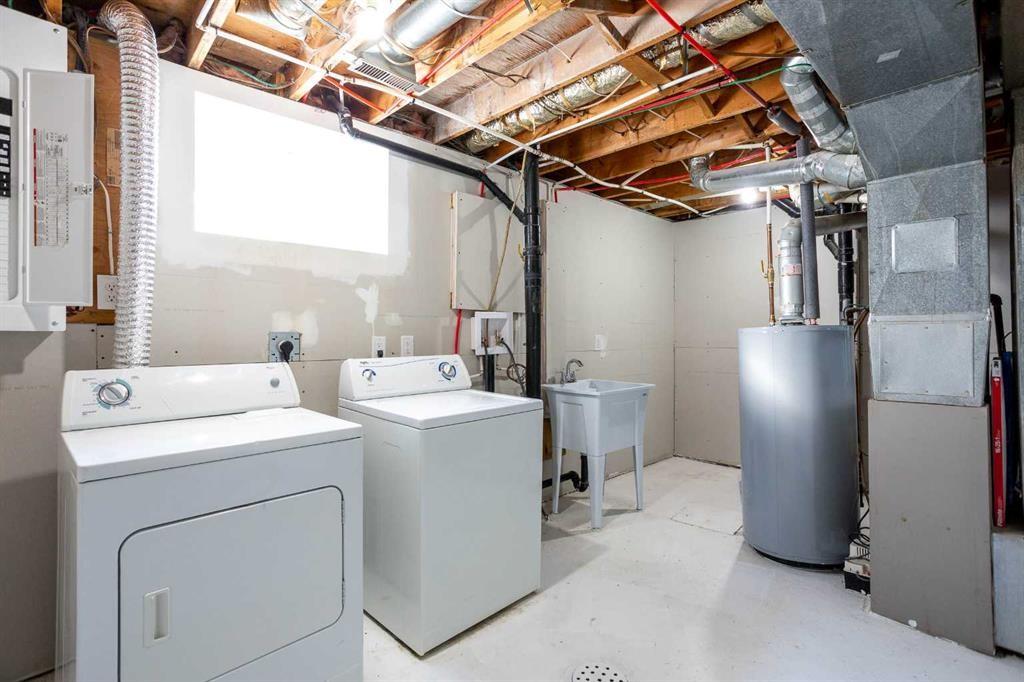 68 Abergale Way Ne, Calgary, AB - Indoor Photo Showing Laundry Room