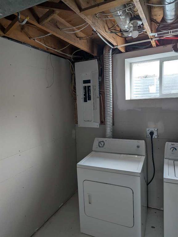 68 Abergale Way Ne, Calgary, AB - Indoor Photo Showing Laundry Room