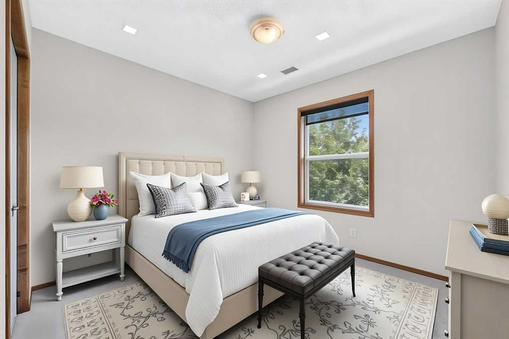 249 Elgin Manor Se, Calgary, AB - Indoor Photo Showing Bedroom