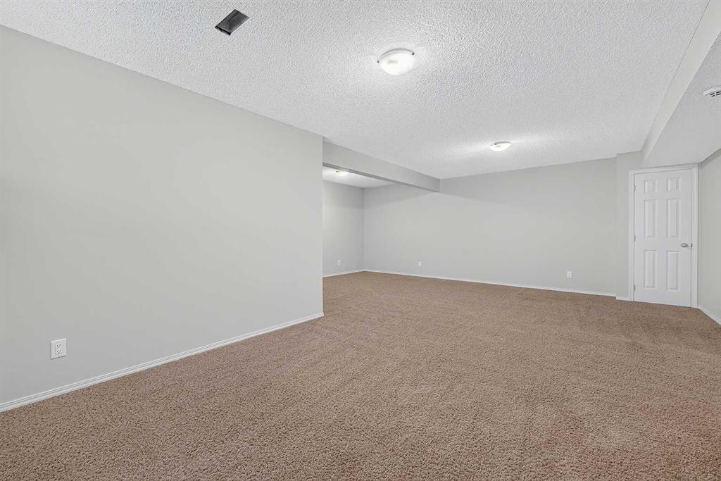 249 Elgin Manor Se, Calgary, AB - Indoor Photo Showing Other Room