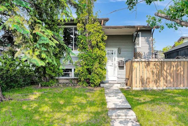 215 ERIN WOODS Drive SE Calgary, AB T2B 2V7
